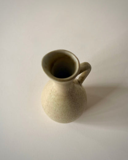 Rörstrand SYE stoneware vase by Carl-Harry Stålhane, front view with the handle in profile