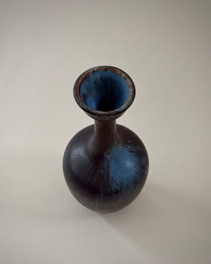 Rörstrand ASI vase showing its rounded body, slender neck and dark Hares Fur glaze.