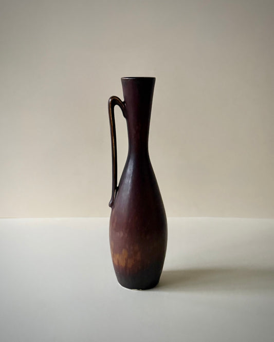 Full view of the Rörstrand NSZ vase showing its deep reddish-brown glaze and original paper label.