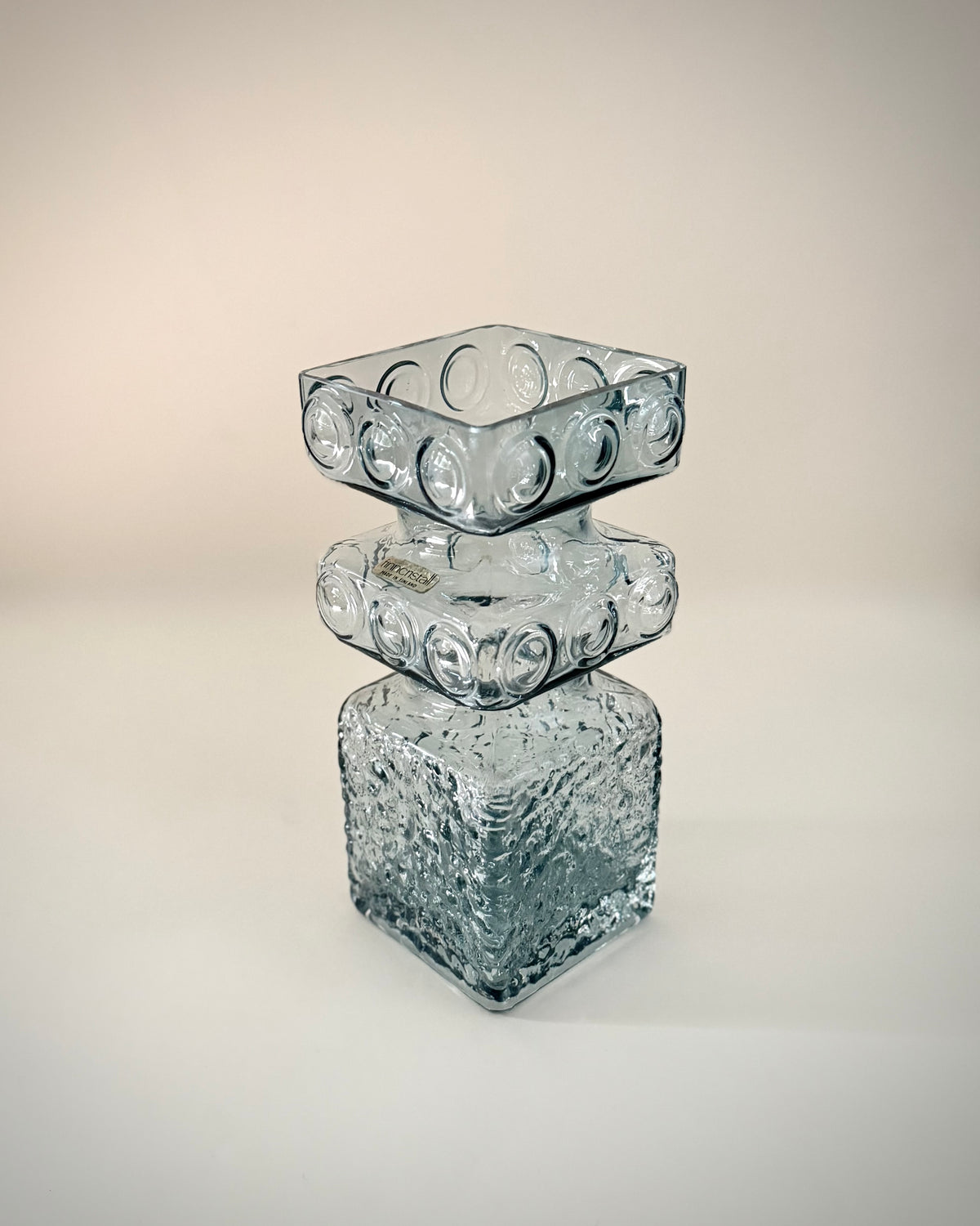 Side view of the Kehrä 1496 vase showing the moulded square base and textured glass surface.
