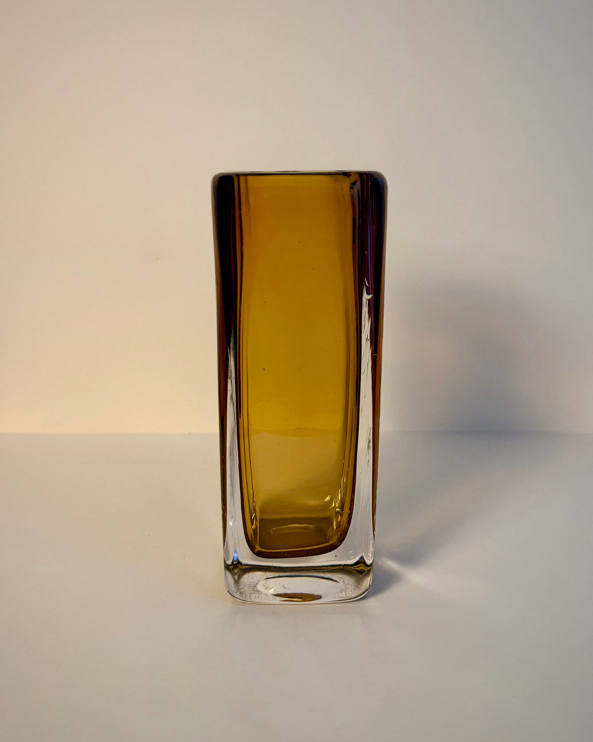 Top view of the Kosta LH 1898/227 Sommerso vase by Vicke Lindstrand, showing the rounded square rim and amber core