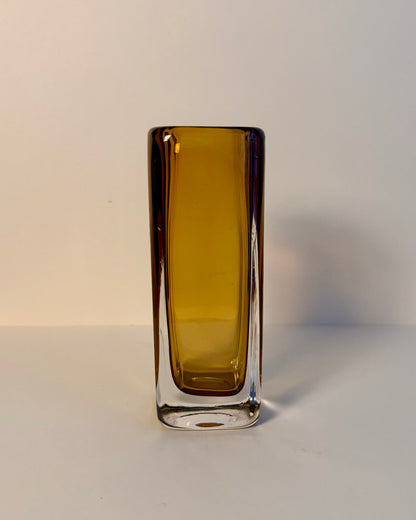 Kosta LH 1898/227 Sommerso glass vase by Vicke Lindstrand lying on its side, showing the amber core and clear glass casing